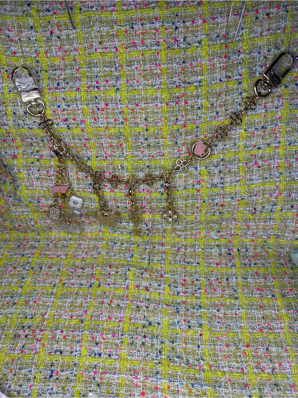 A great Gold-Tone Flower Charm Bracelet with Pink Accents